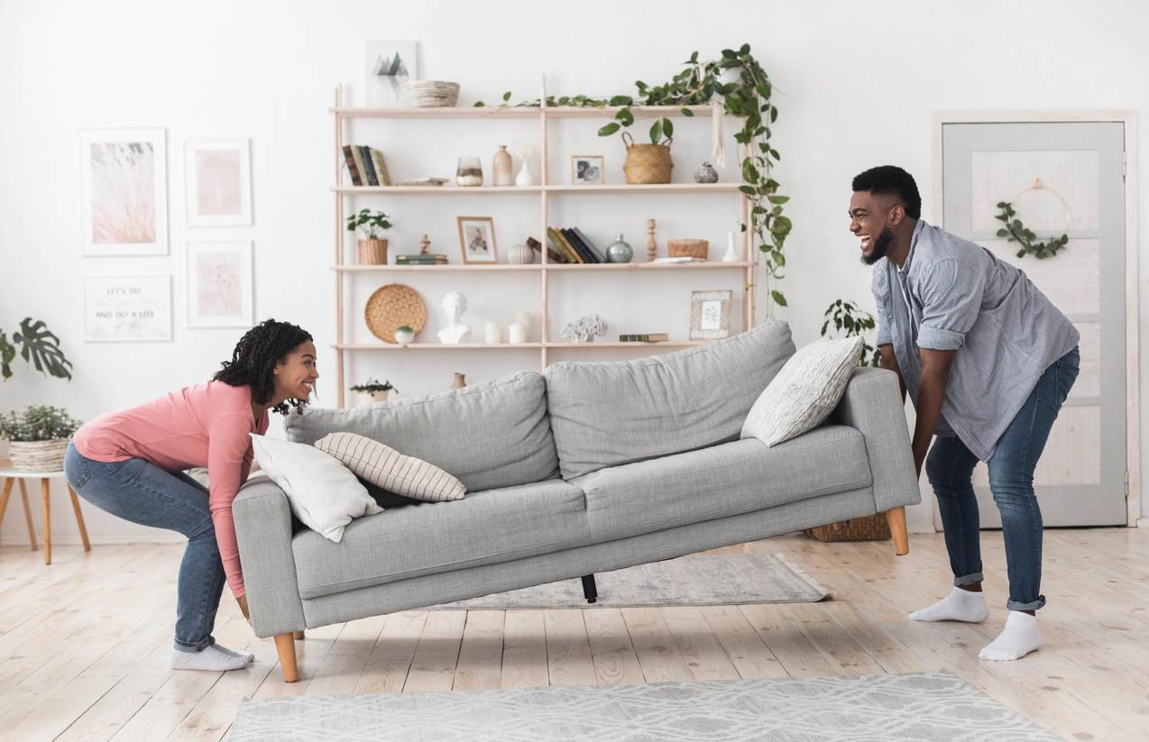 Couple Moving Couch