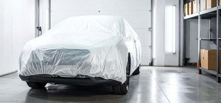 covered car inside storage unit