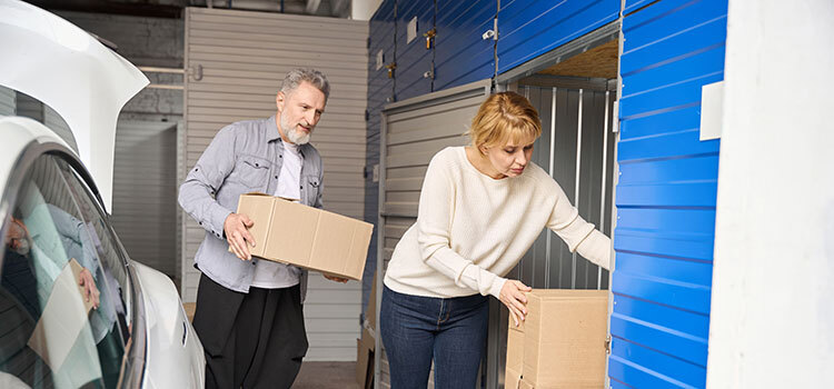 couple working on their self storage unit