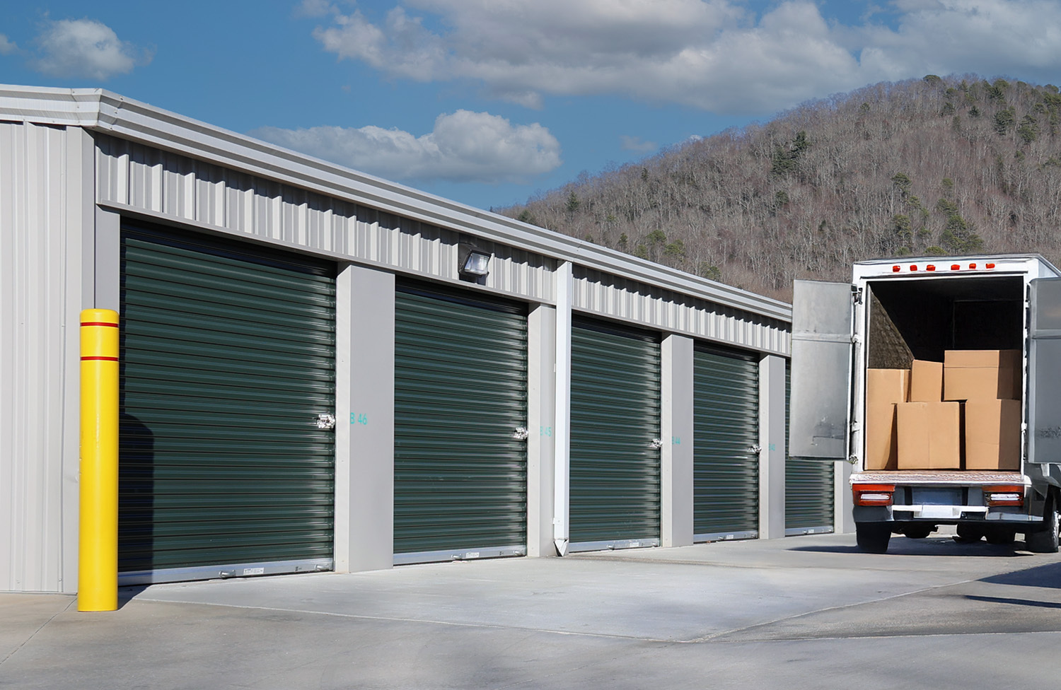 Moving truck unloading at a self storage facility with secure access and great customer service in Rabun County, GA
