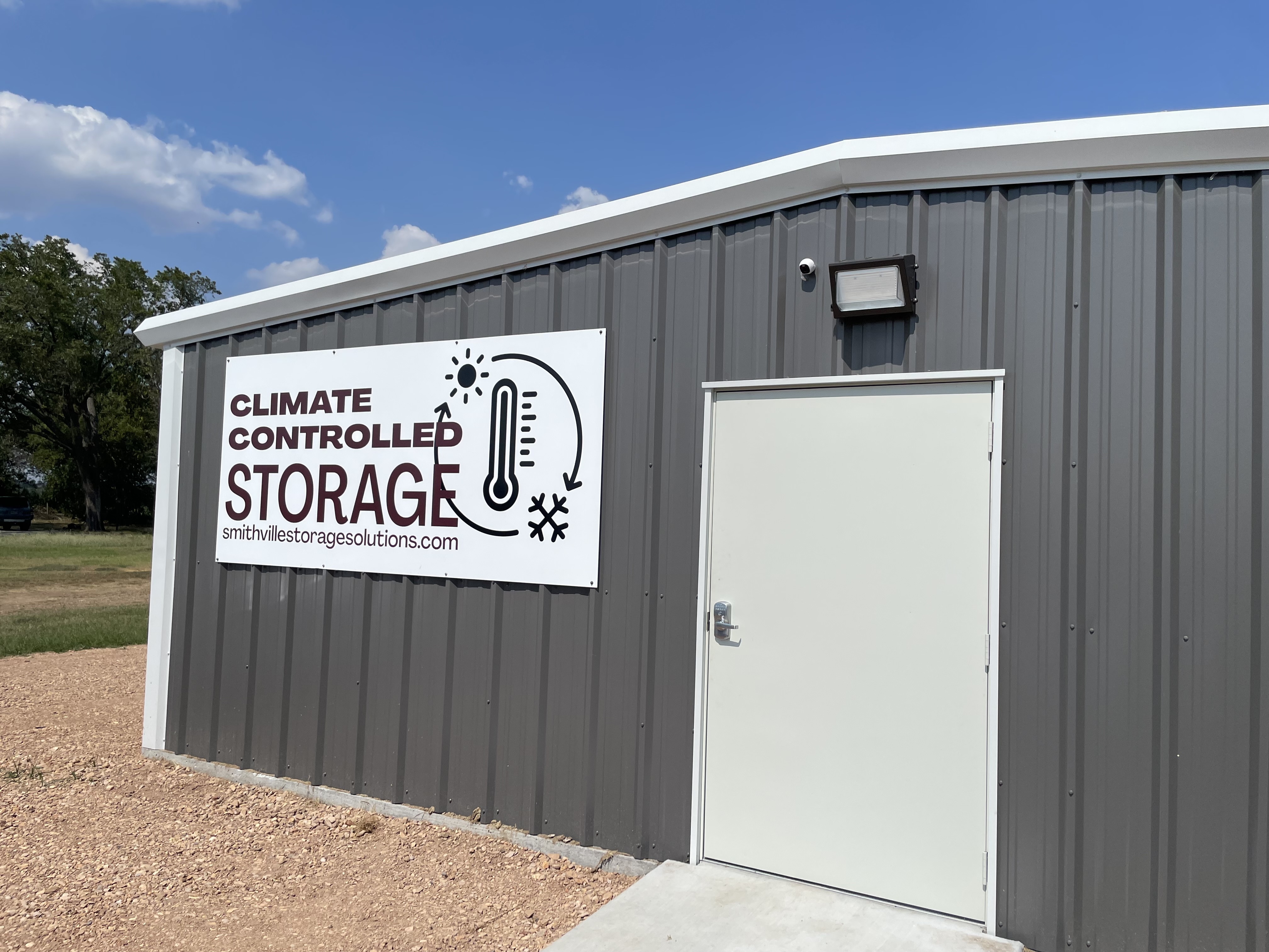 View from the road of the storage unit building - climate controlled storage in Smithville, Texas