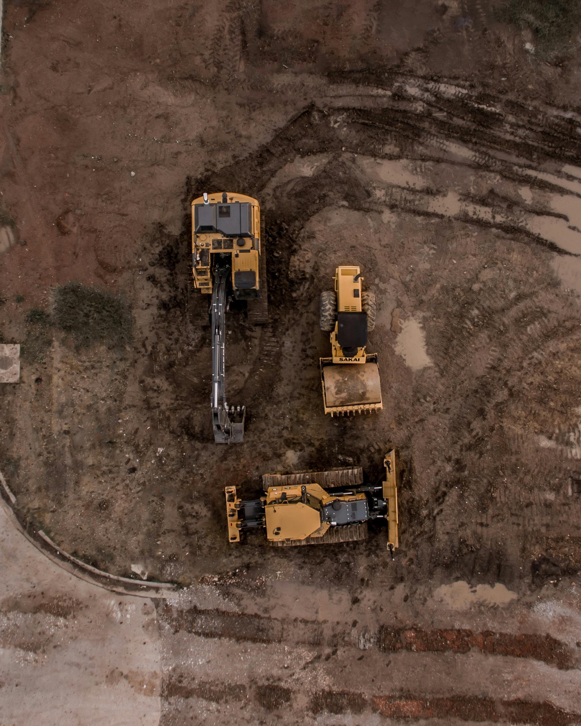 Ariel view of construction equipment on dirt lot