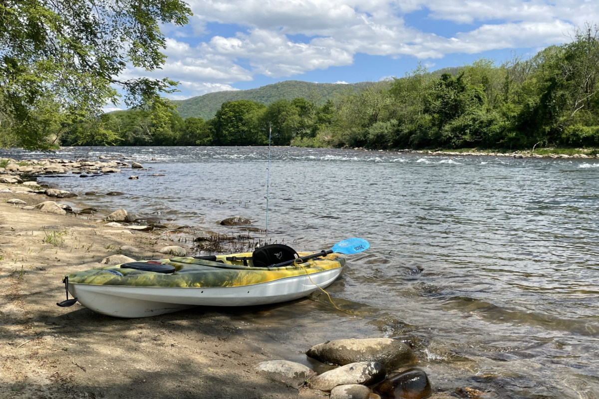 Kayaking on the Nolichucky River in East Tennessee with scenic mountain views