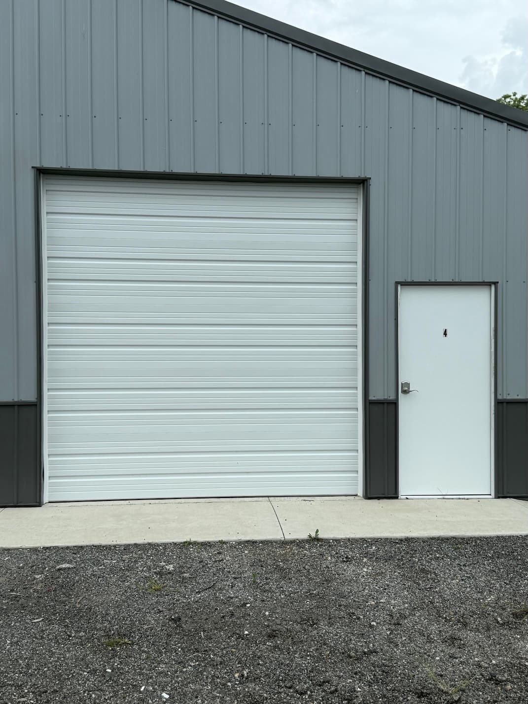 Secured individual indoor storage unit at Route 54 Boat & RV Storage near Clinton Lake with locked roll-up door and walk-in entry