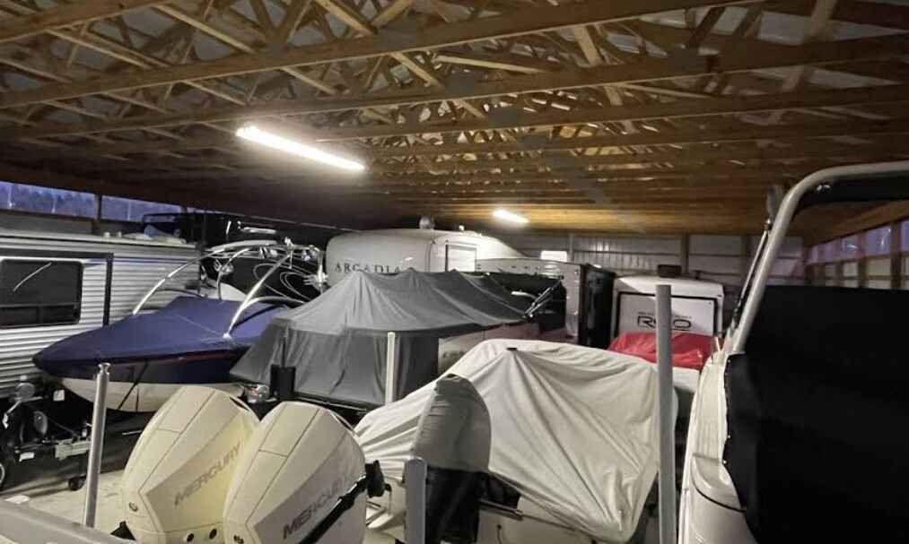 Covered boats in Williamsburg, MI at Williamsburg All Seasons Storage Covered boats in Williamsburg, MI at Williamsburg All Seasons Storage