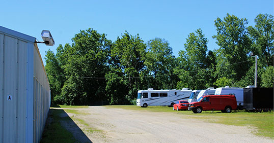 Outdoor parking area for boats and RVs at EZ Storage & Rentals