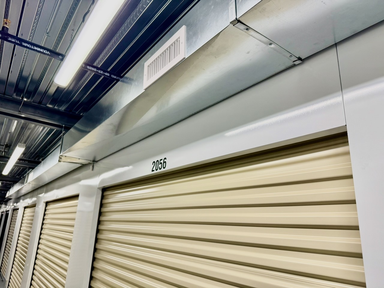 Climate control ductwork and a supply air vent above the storage units at Southbury Self Storage