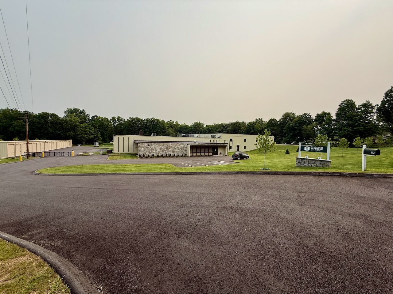 Southbury Self Storage monument sign and building at the Poverty Road entrance