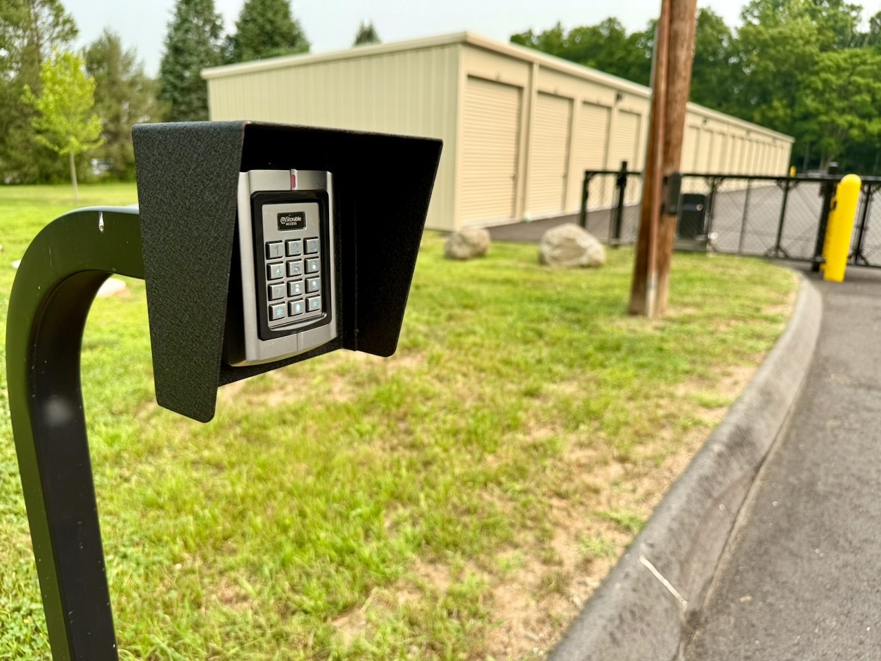 The Storable Access keypad at the gated entrance to Southbury Self Storage where tenants enter their code