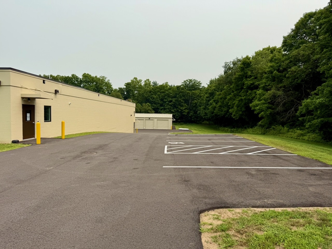 View from the upper drive at Southbury Self Storage looking across the parking lot toward Building 3