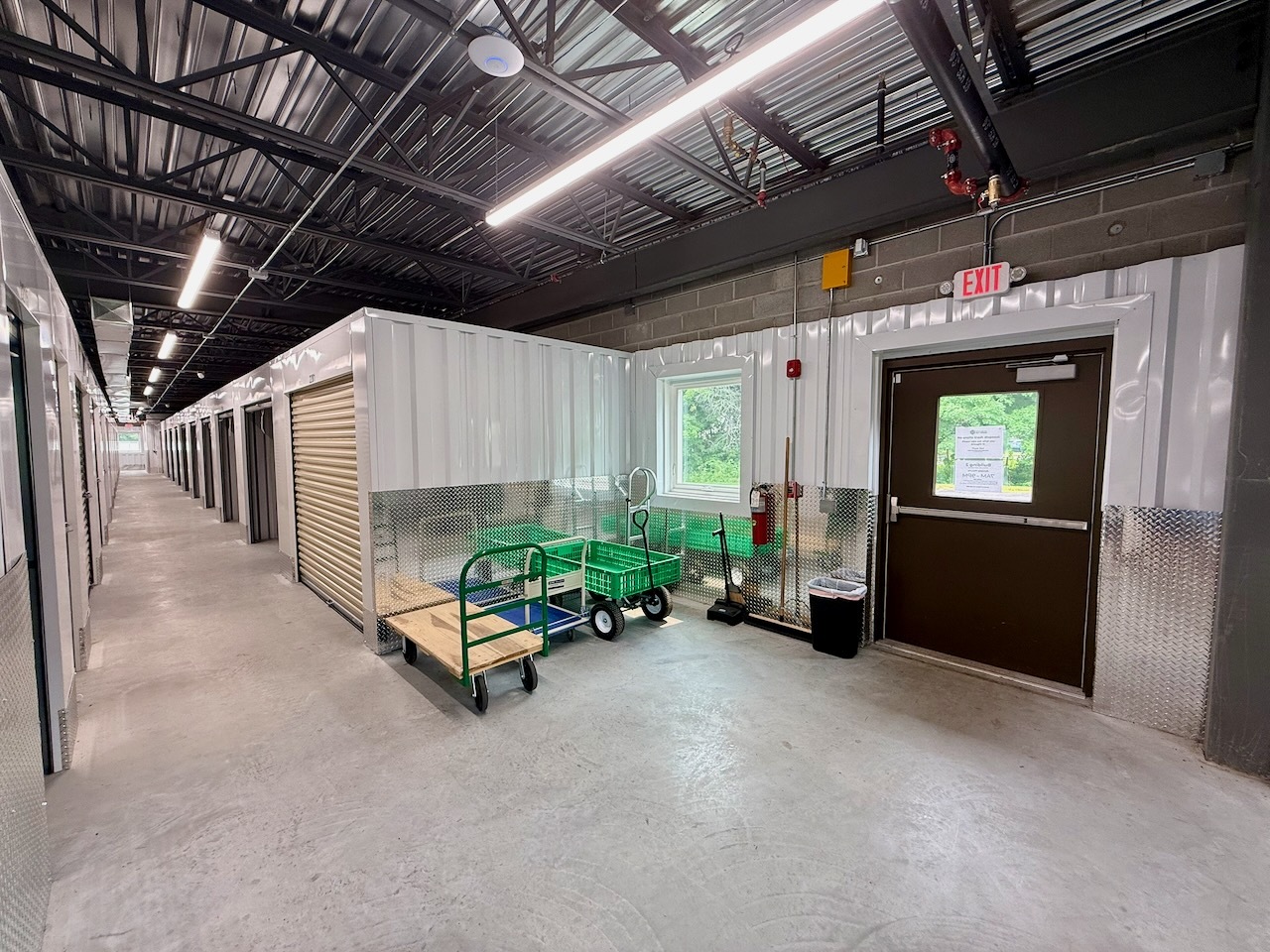Storage hallway with free carts at Southbury Self Storage near Oxford CT