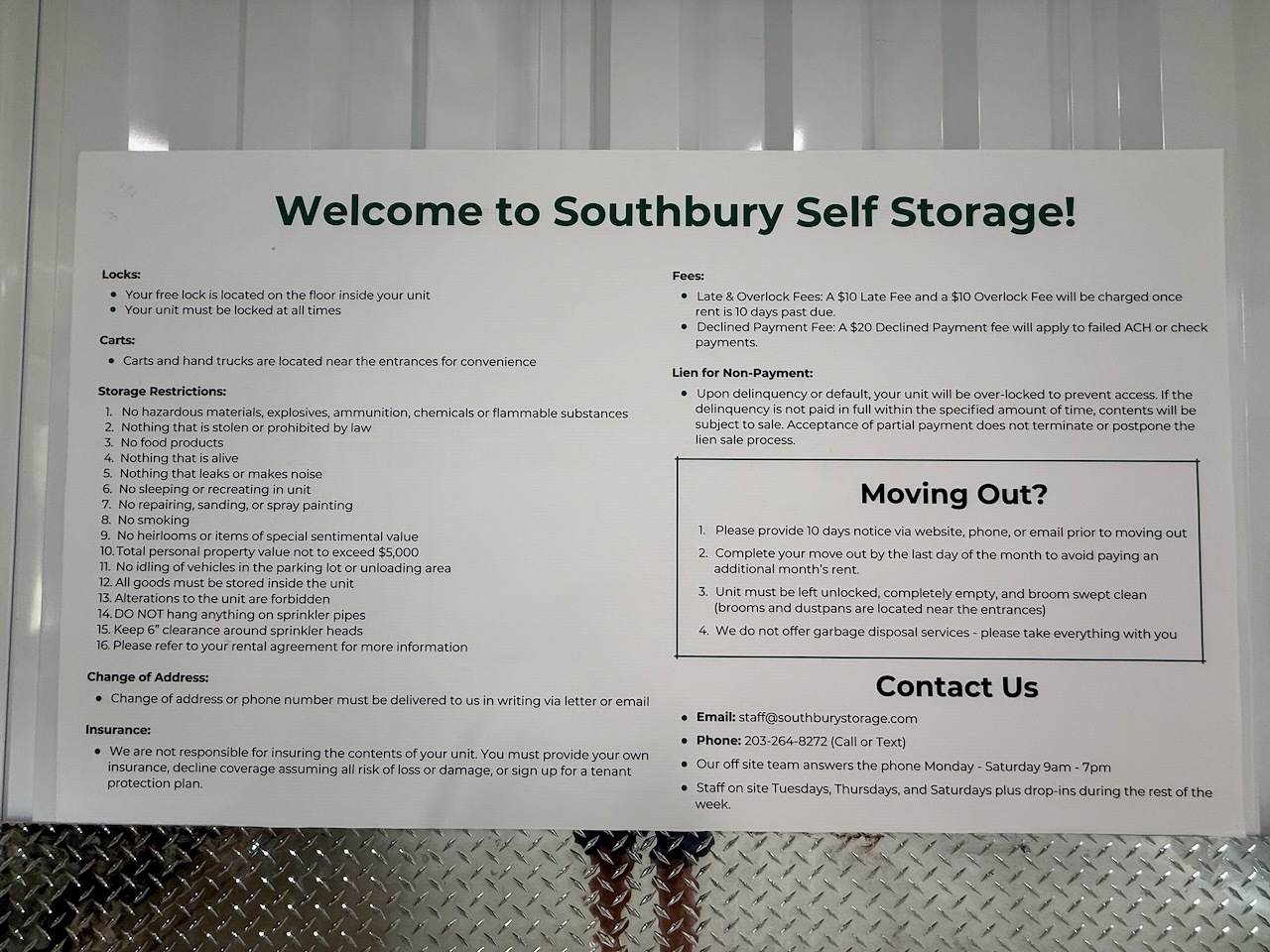 The printed welcome and facility policy board posted inside Southbury Self Storage