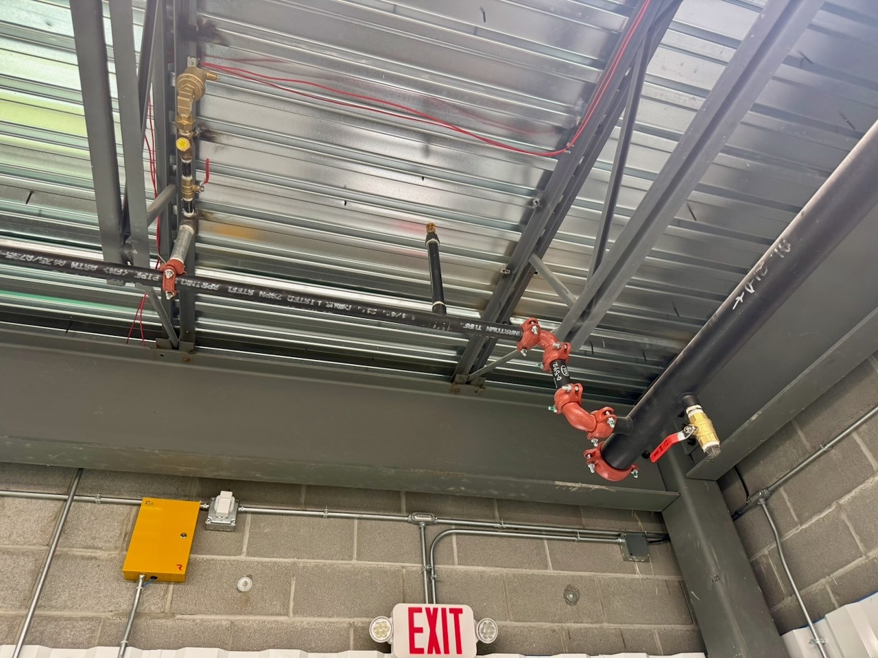 Fire sprinkler system running throughout the storage buildings at Southbury Self Storage