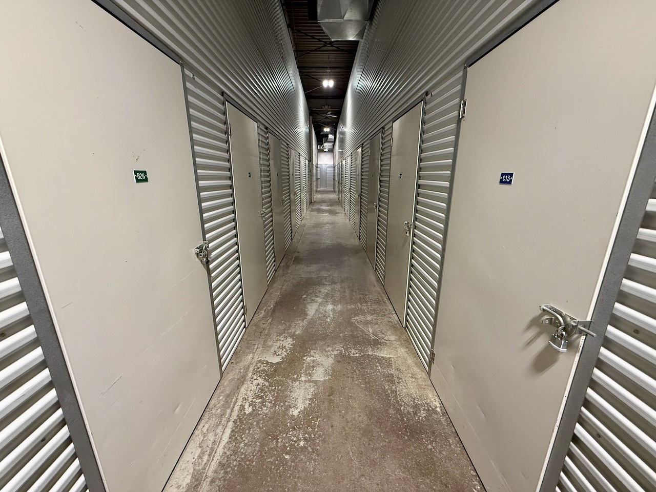 Clean interior hallway lined with storage units at Southbury Self Storage
