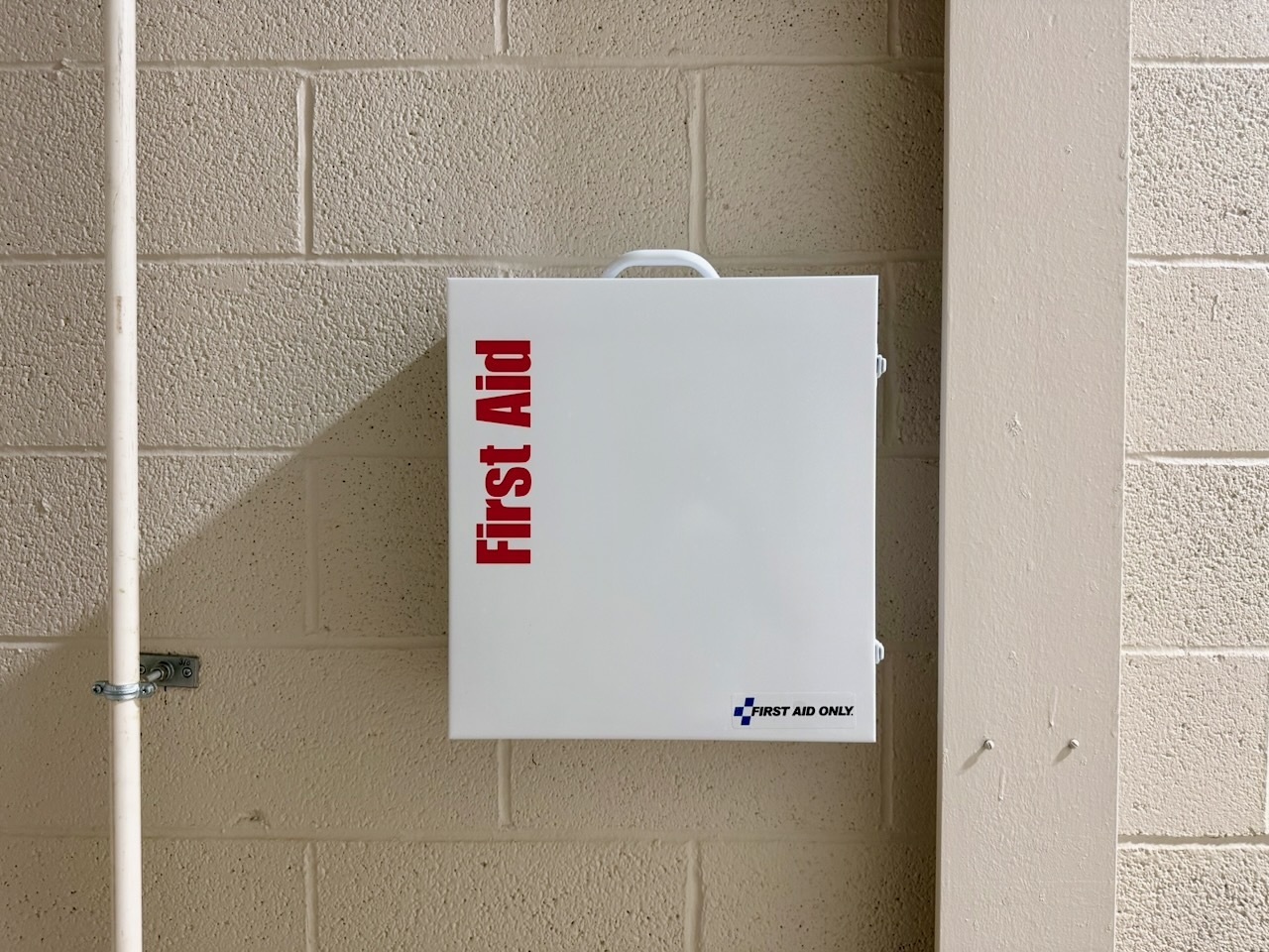 A wall mounted first aid cabinet on site at Southbury Self Storage