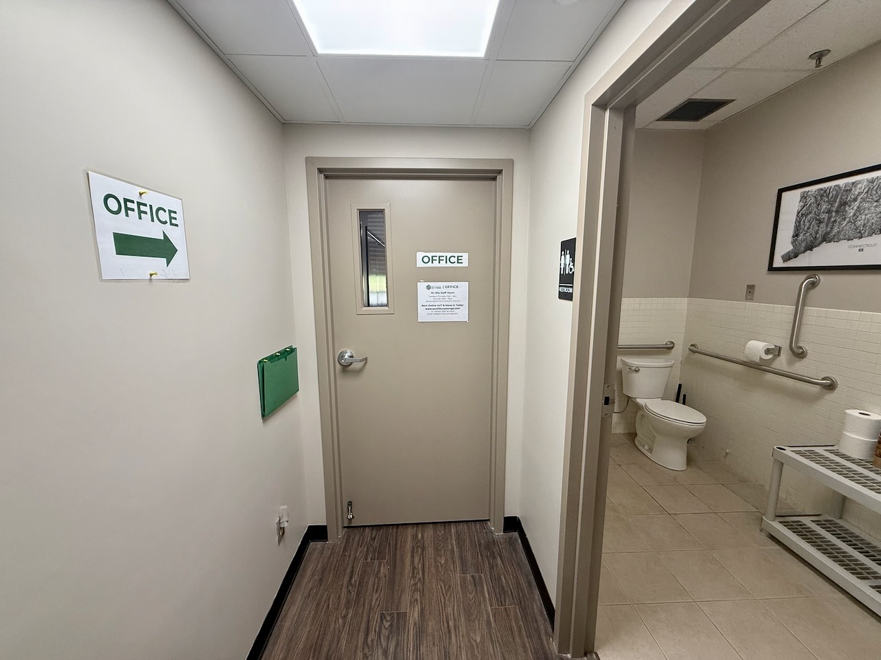 The office hallway and accessible customer restroom at Southbury Self Storage