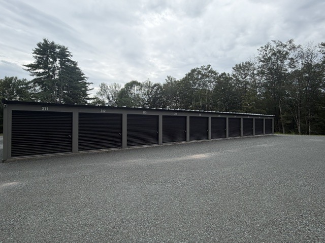 Row of drive-up storage units at Woodstock Way Self Storage