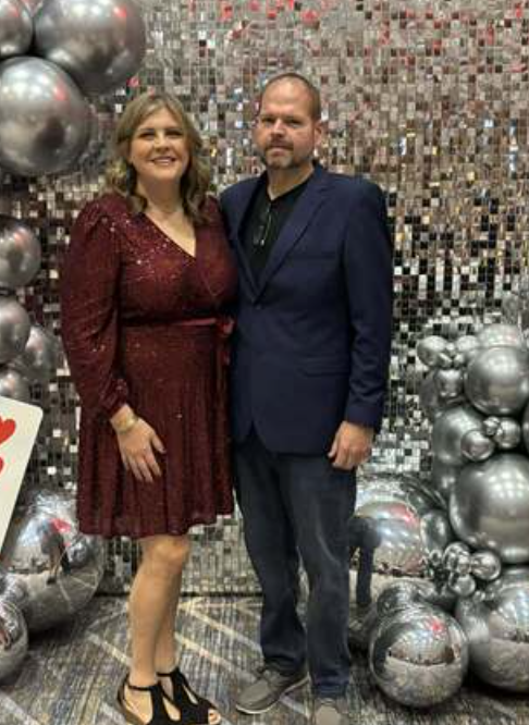 Jarrid & Michelle Perry posing at the Voices for Children Gala Jarrid & Michelle Perry posing at the Voices for Children Gala