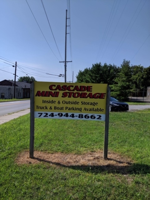 Up-Close View Of Storage Facility Sign